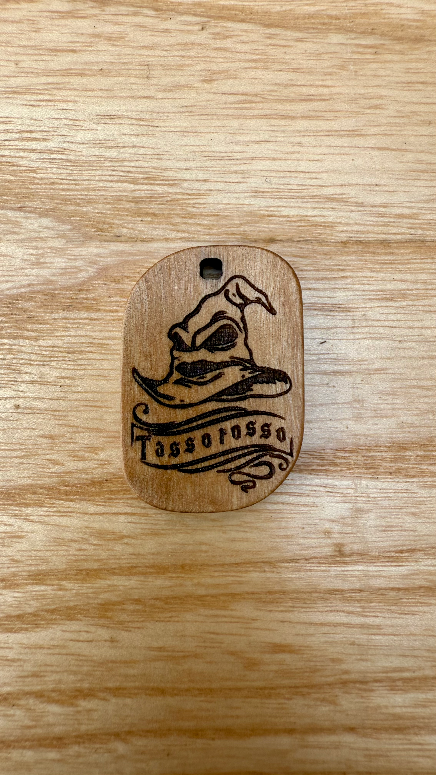 ciondolo in legno tassorosso