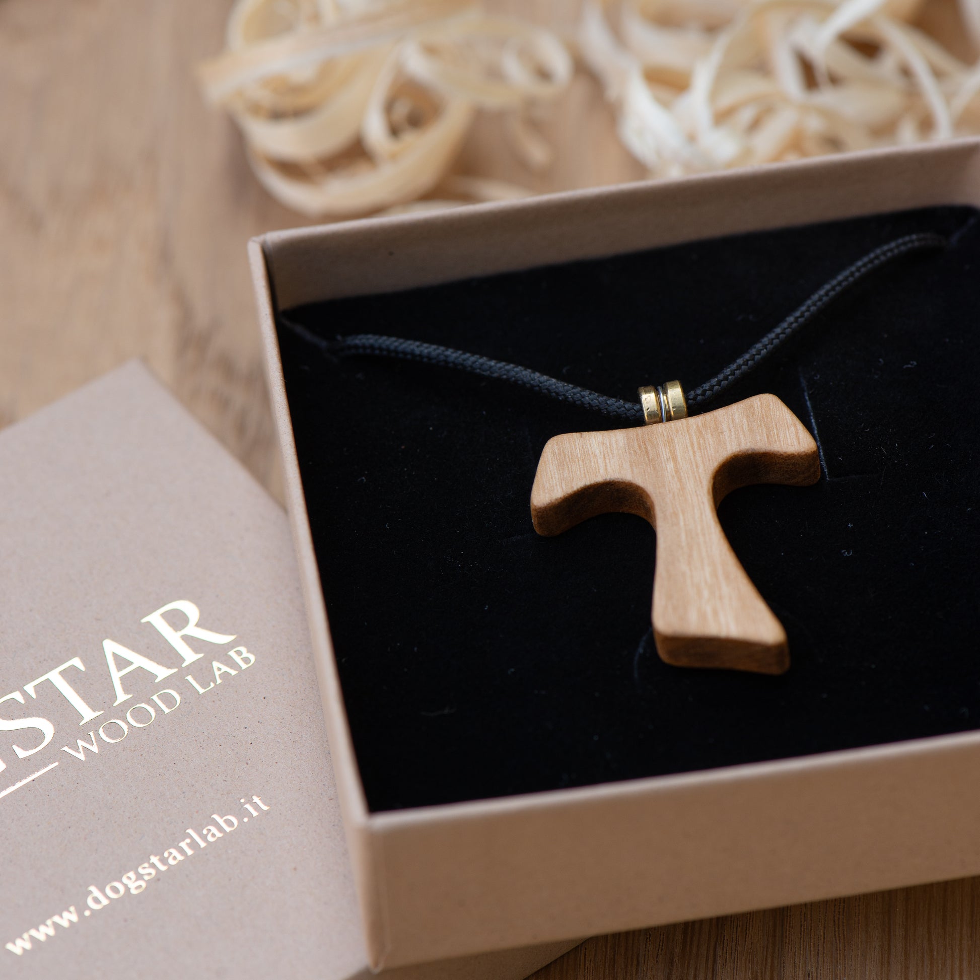 Olive wood Tau cross pendant in FSC certified Dogstar Wood Lab packaging