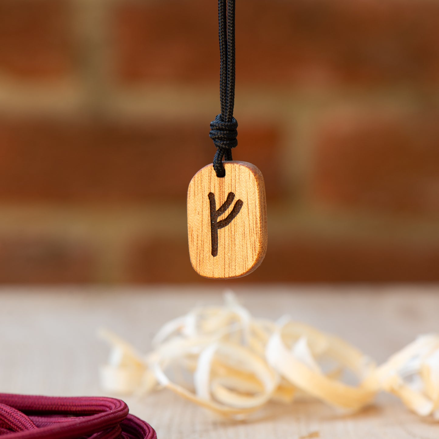 fehu-rune-engraved-on-okoumè-wood