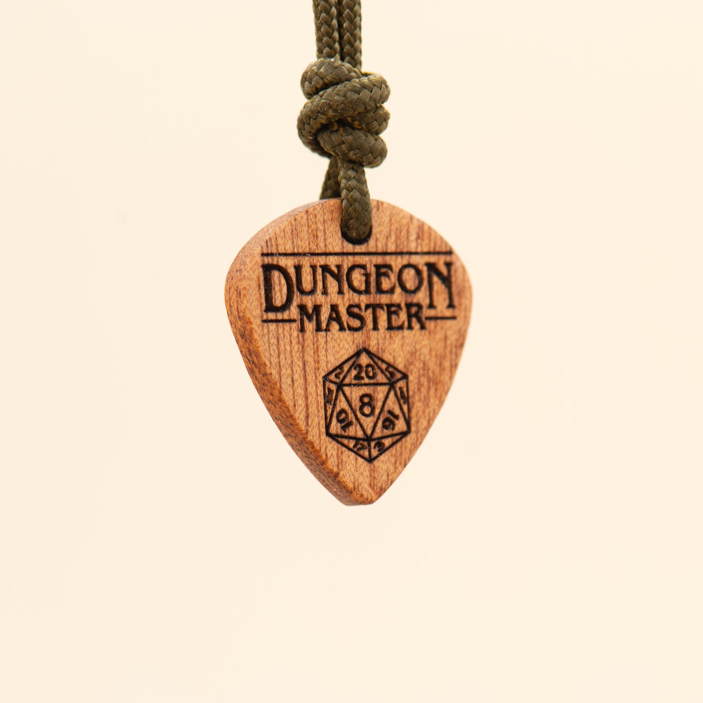 Side view of a Dungeon Master wooden pendant inspired by fantasy role-playing culture