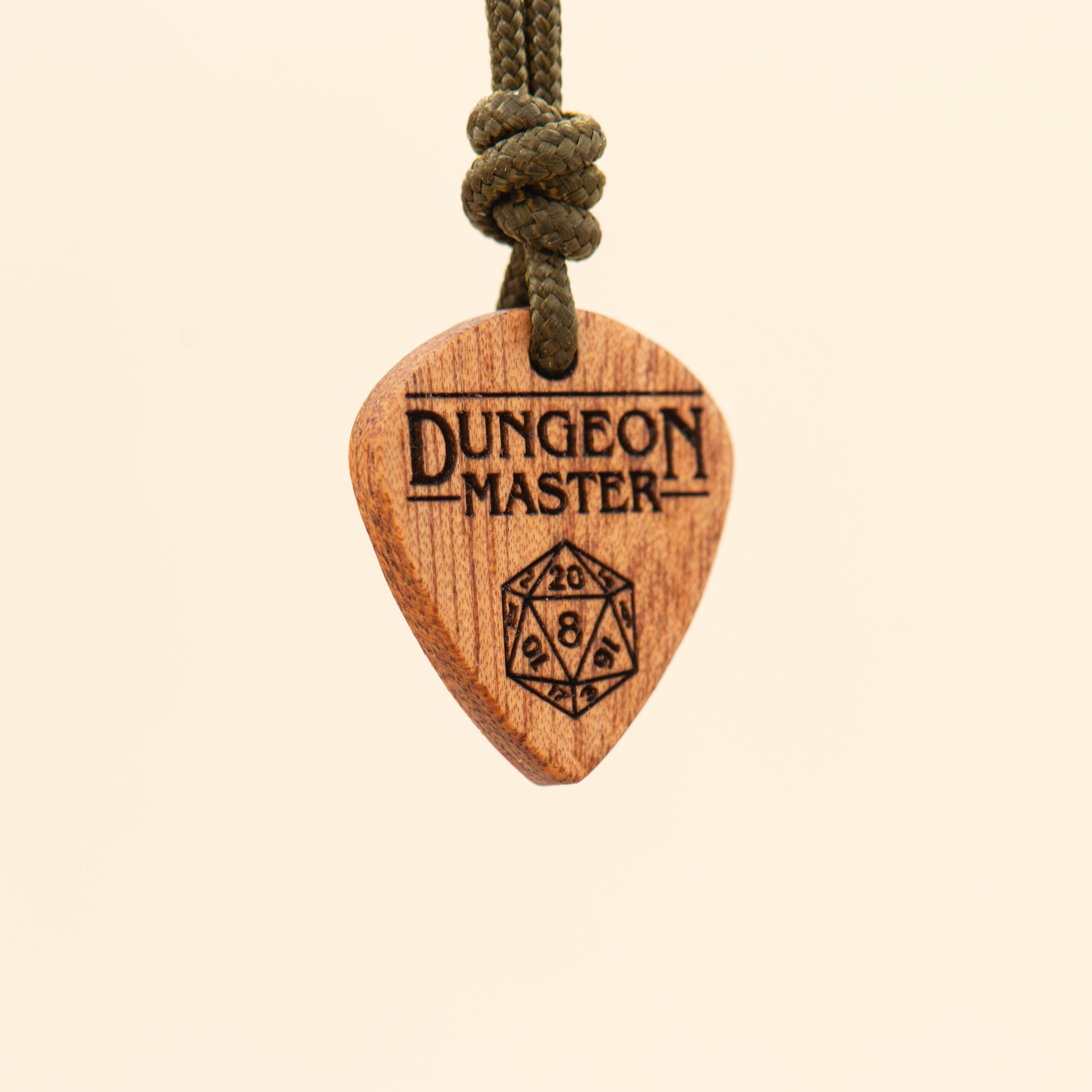 Side view of a Dungeon Master wooden pendant inspired by fantasy role-playing culture